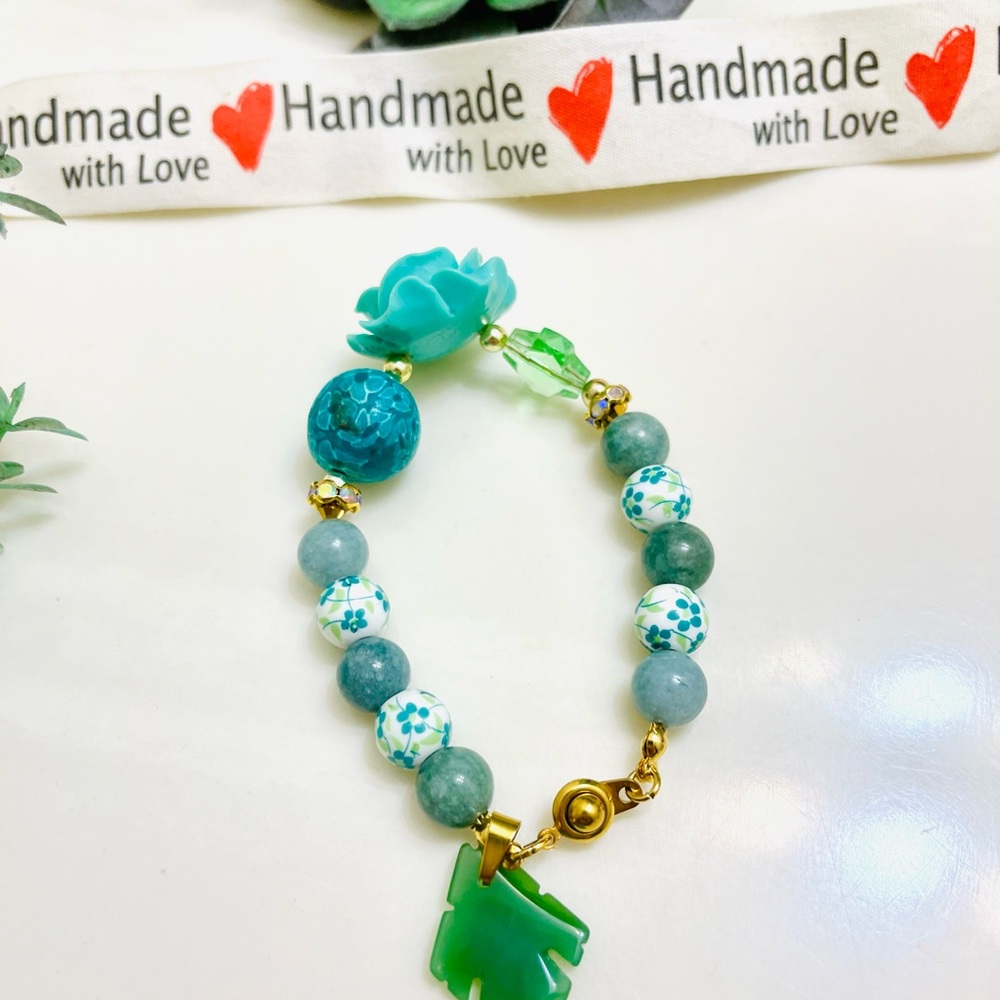 Jade Charmed Bracelets with ceramic flower beads.